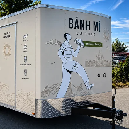 The Bánh Mì Culture food truck, side view with the walking illustration